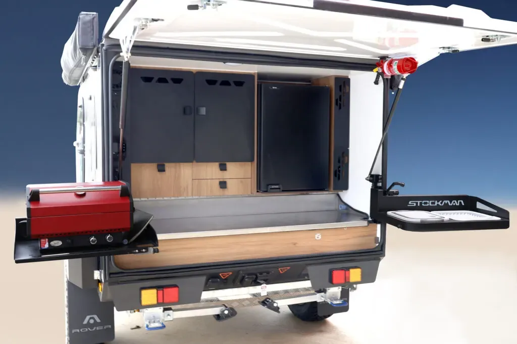 Stockman Rover rear opened up with the outdoor kitchen and BBQ